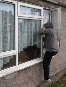 climbing in window