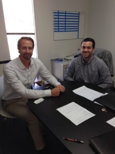 two men in a meeting